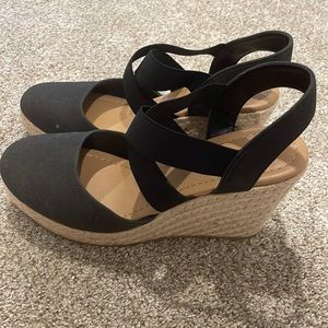 Black canvas shoe with braided wedge heel. New size 9